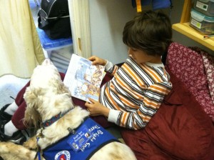 James demonstrates proper positioning of the Reading Buddy.  James is always interested in looking at the pictures in the book.  He's a great listener.